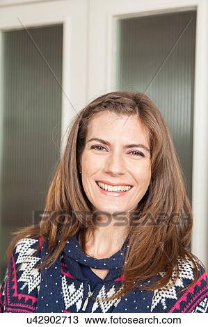 Pretty woman smiling View Large Photo Image Stock Image - Pretty woman smiling. Fotosearch