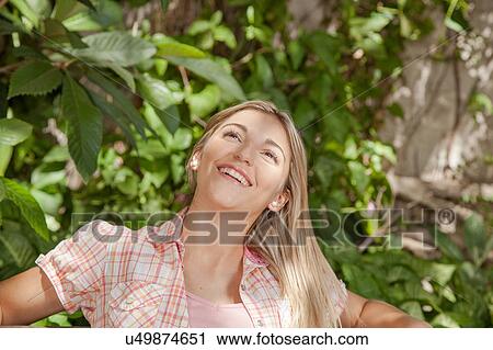 Stock Image - Pretty woman smiling. Fotosearch
