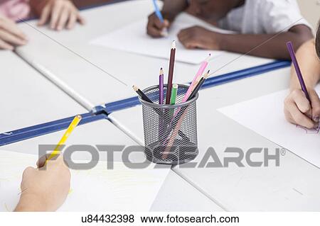 Stock Photo - Pupils drawing. Fotosearch