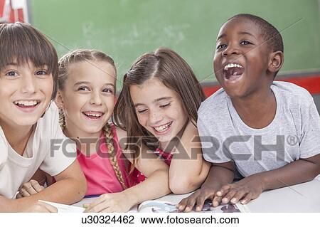 pupils laughing togethers View Large Photo Image Stock Image - pupils laughing togethers. Fotosearch