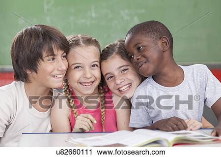 pupils laughing togethers View Large Photo Image Stock Image - pupils laughing togethers. Fotosearch