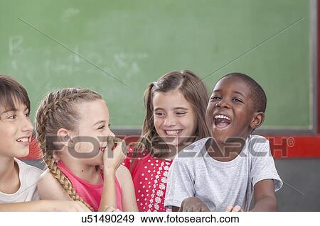 pupils laughing togethers View Large Photo Image Stock Photo - pupils laughing togethers. Fotosearch