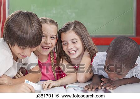 Stock Photograph - pupils laughing togethers. Fotosearch