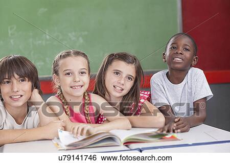 Pupils looking at the teacher View Large Photo Image Stock Photograph - Pupils looking at the teacher. Fotosearch