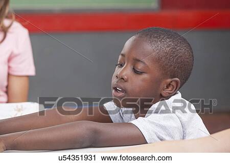 Stock Image - Quiet african boy. Fotosearch