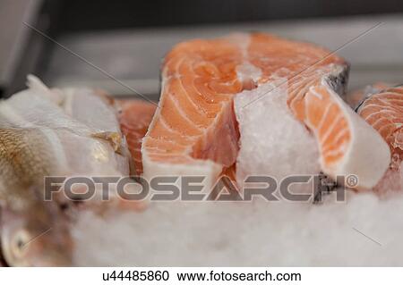 Stock Image - Salmon pink in slices. Fotosearch