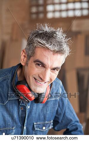 Smiling carpenter View Large Photo Image Stock Image - Smiling carpenter . Fotosearch