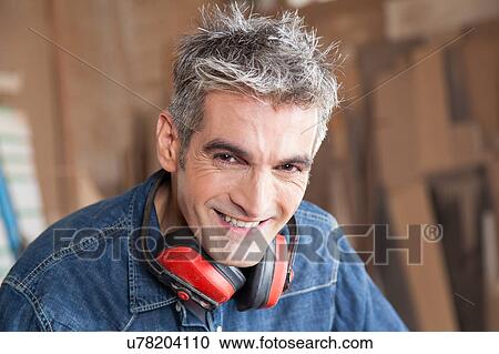 Smiling carpenter View Large Photo Image Stock Image - Smiling carpenter . Fotosearch