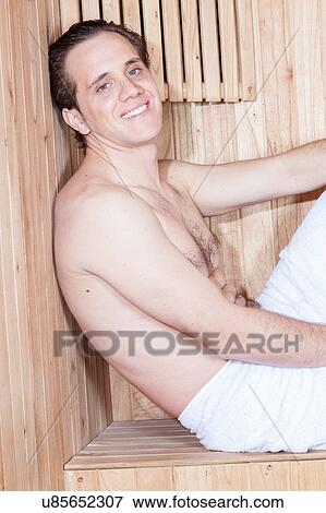 Stock Photo - Smiling man in sauna. Fotosearch