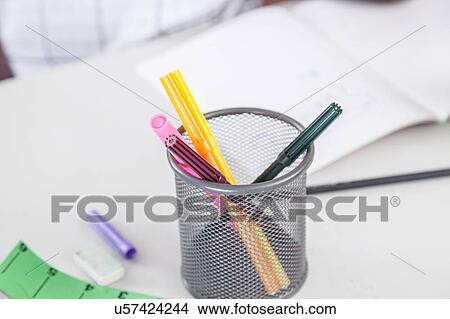 Picture - student's desk. Fotosearch