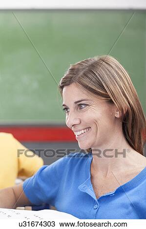 Teacher smiling View Large Photo Image Stock Image - Teacher smiling. Fotosearch