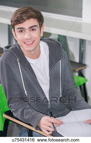 Stock Photograph - teenager studying. Fotosearch