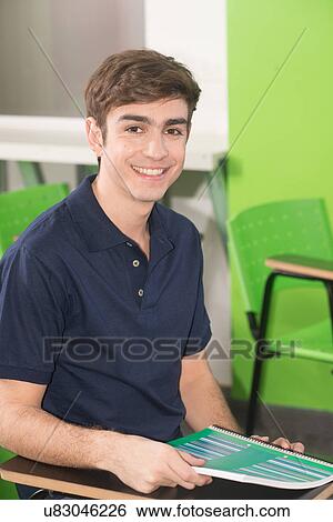 Stock Photograph - teenager studying. Fotosearch
