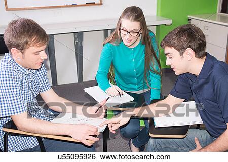 Stock Photograph - Teenagers in school. Fotosearch