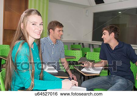 Stock Photograph - Teenagers in school. Fotosearch