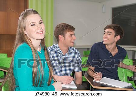 Stock Photograph - Teenagers in school. Fotosearch