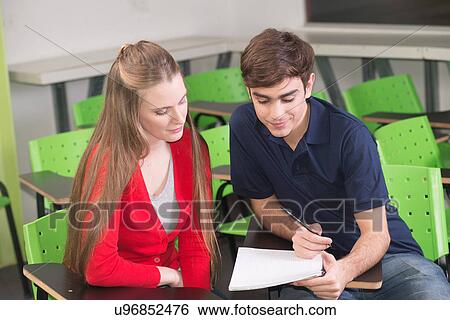 Stock Photograph - Teenagers in school. Fotosearch