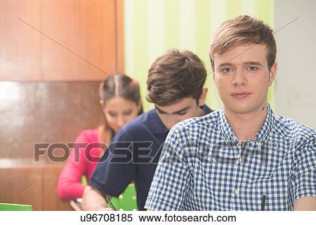 Stock Photography - Teenagers in school. Fotosearch