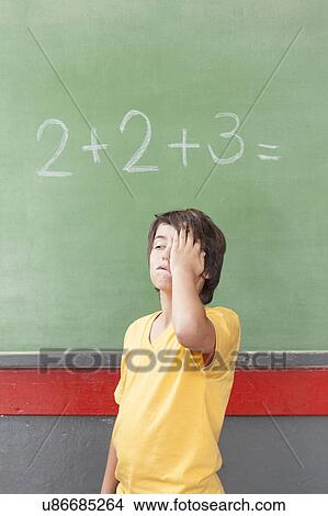 Picture - The boy is tired. Fotosearch
