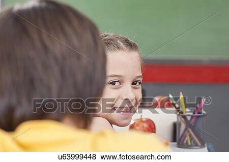 The girl looking at back View Large Photo Image Stock Photo - The girl looking at back. Fotosearch