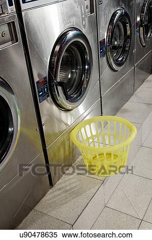Stock Photography - The laundry with baskets. Fotosearch