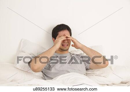 Stock Image - The man is crying. Fotosearch