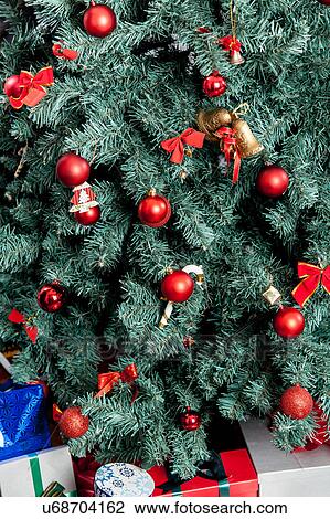 Stock Image - The presents under the christmas tree. Fotosearch