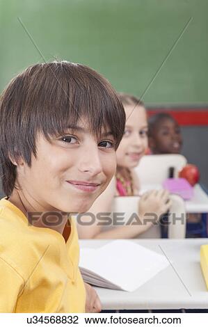 Stock Image - The students looking at back. Fotosearch