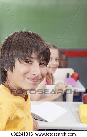 Stock Photograph - The students looking at camera. Fotosearch