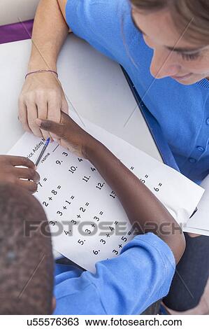 The teacher holding hand's pupil View Large Photo Image Stock Image - The teacher holding hand's pupil. Fotosearch