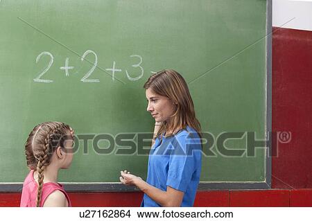 The teacher teaching math View Large Photo Image Picture - The teacher teaching math. Fotosearch