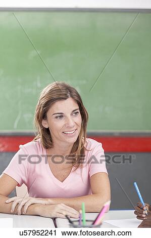 Stock Image - The teacher teaching. Fotosearch