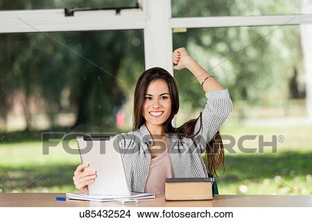 Picture - Woman celebrating. Fotosearch