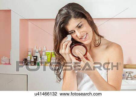 Woman cleans your face View Large Photo Image Stock Image - Woman cleans your face. Fotosearch