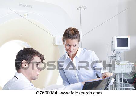Picture - Woman get a tomography. Fotosearch