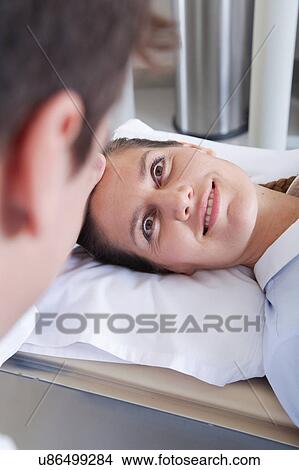 Picture - Woman get a tomography. Fotosearch
