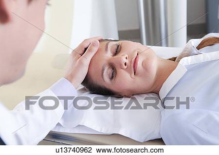 Stock Image - Woman get a tomography. Fotosearch