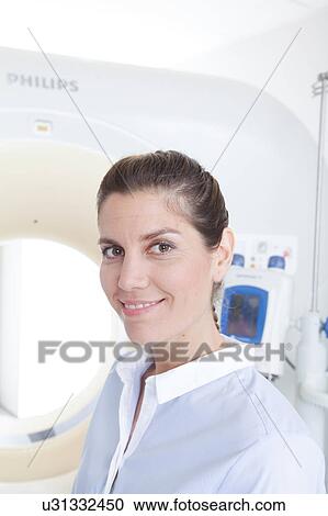Stock Image - Woman get a tomography. Fotosearch