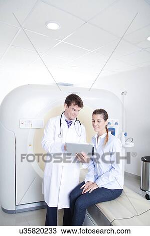 Stock Image - Woman get a tomography. Fotosearch