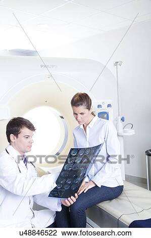 Stock Image - Woman get a tomography. Fotosearch