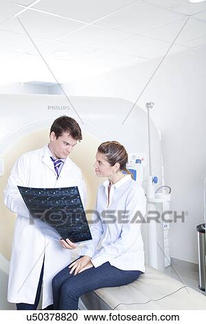 Stock Image - Woman get a tomography. Fotosearch