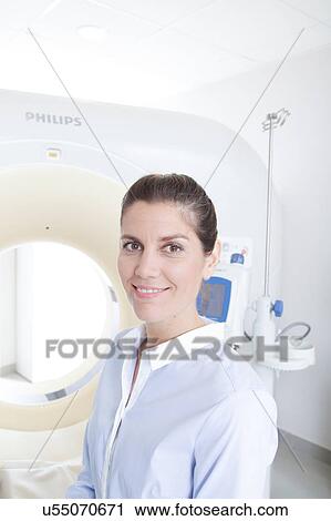 Stock Image - Woman get a tomography. Fotosearch