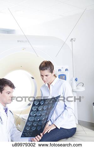 Stock Image - Woman get a tomography. Fotosearch
