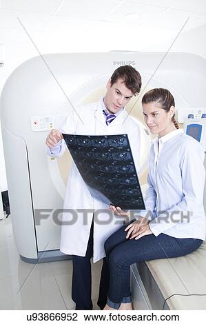 Stock Image - Woman get a tomography. Fotosearch