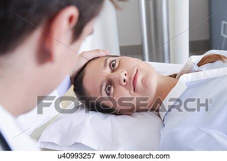 Woman get a tomography View Large Photo Image Stock Photo - Woman get a tomography. Fotosearch