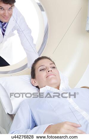 Woman get a tomography View Large Photo Image Stock Photo - Woman get a tomography. Fotosearch