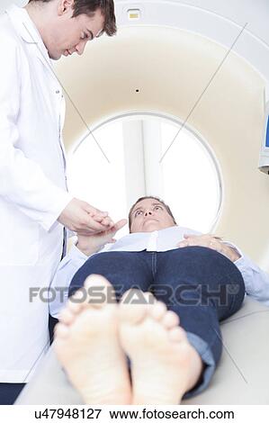 Woman get a tomography View Large Photo Image Stock Photo - Woman get a tomography. Fotosearch