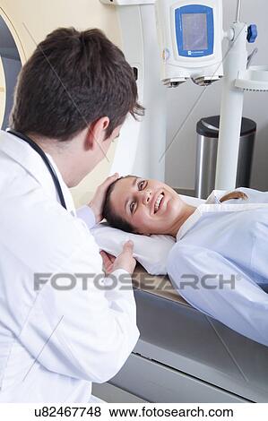 Woman get a tomography View Large Photo Image Stock Photo - Woman get a tomography. Fotosearch