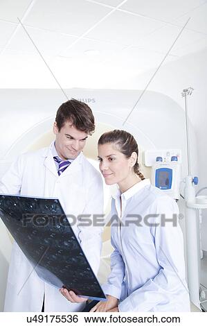 Woman get a tomography View Large Photo Image Stock Photograph - Woman get a tomography. Fotosearch