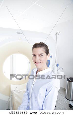 Stock Photograph - Woman get a tomography. Fotosearch